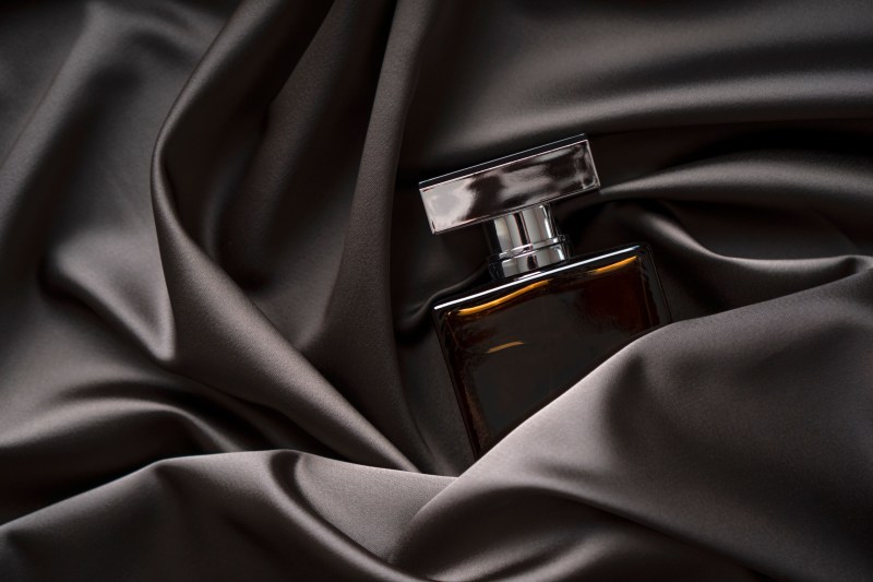 mens cologne on black satin